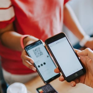 Payment being processed between mobile devices