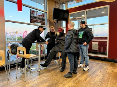 Talking shop with employees at Wendy's in Philadelphia.